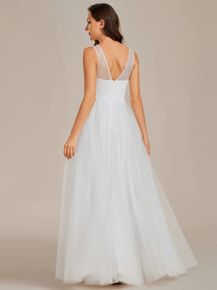 Langes Brautkleid mit raffiniertes Oberteil weiß