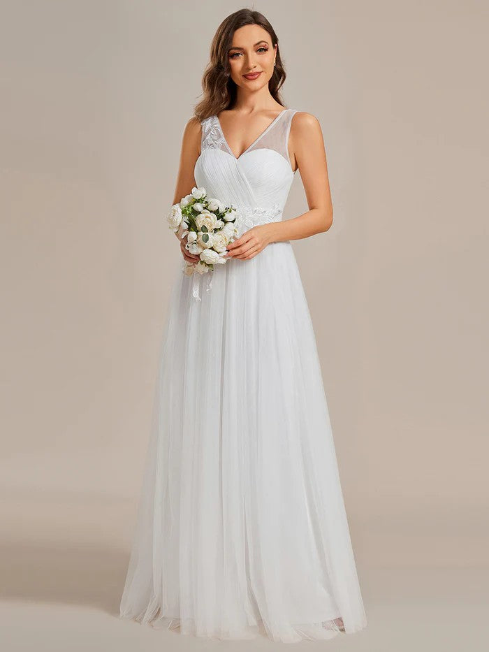 Langes Brautkleid mit raffiniertes Oberteil weiß