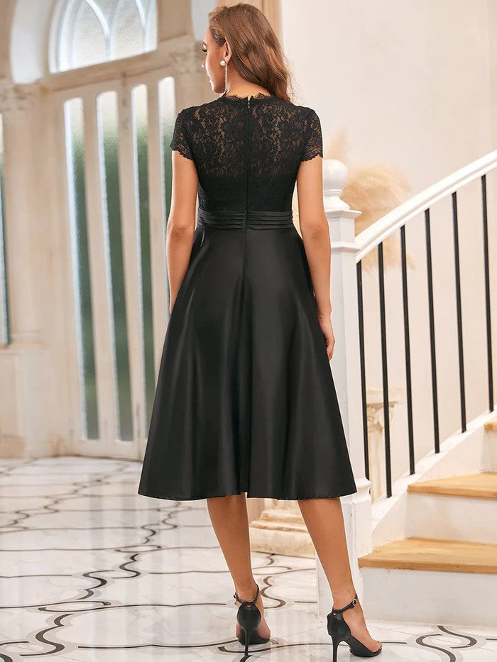 Schwarz Kurz Arm Kleid mit eleganten Spitzen Oberteil & Satin Rock