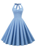 Blaues Neckholder Kleid mit weißen Punkten im 50er & 60er Jahre Stil