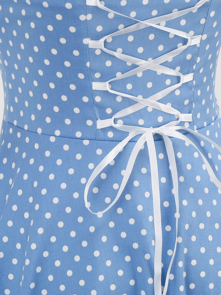 Blaues Neckholder Kleid mit weißen Punkten im 50er & 60er Jahre Stil