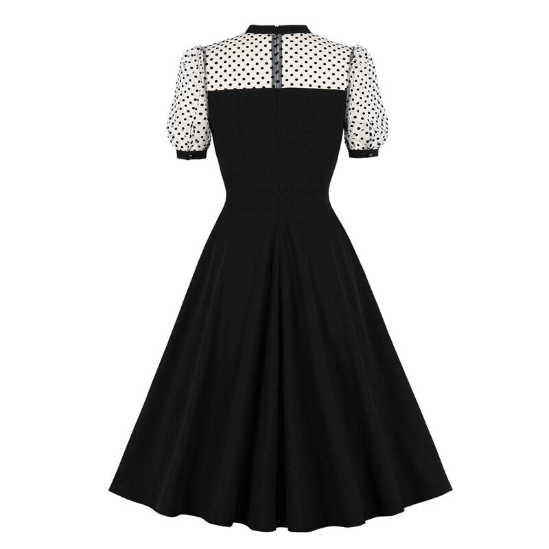 Schwarzes Vintage Kleid mit Herz-Ausschnitt & transparenten Oberteil