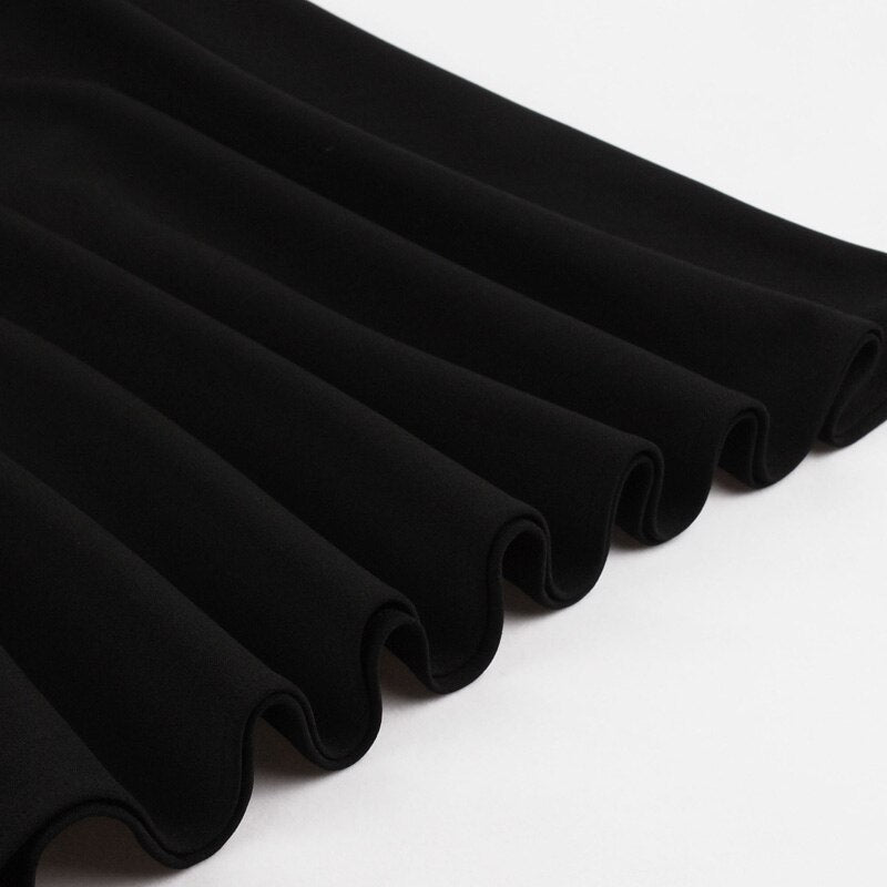 Schwarzes Vintage Kleid mit Herz-Ausschnitt & transparenten Oberteil